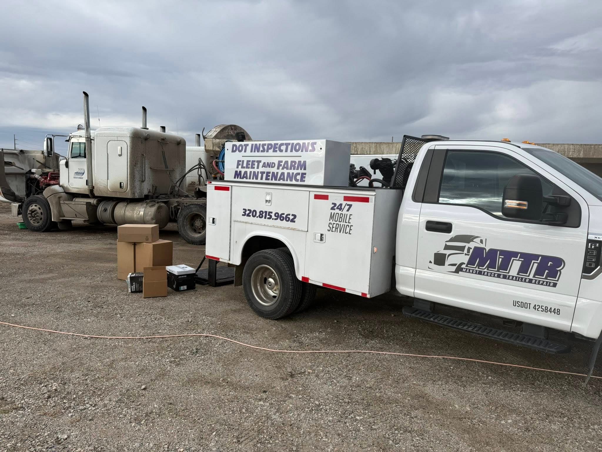 MTTR Mobile diesel technician performing roadside truck repair near Alexandria, MN